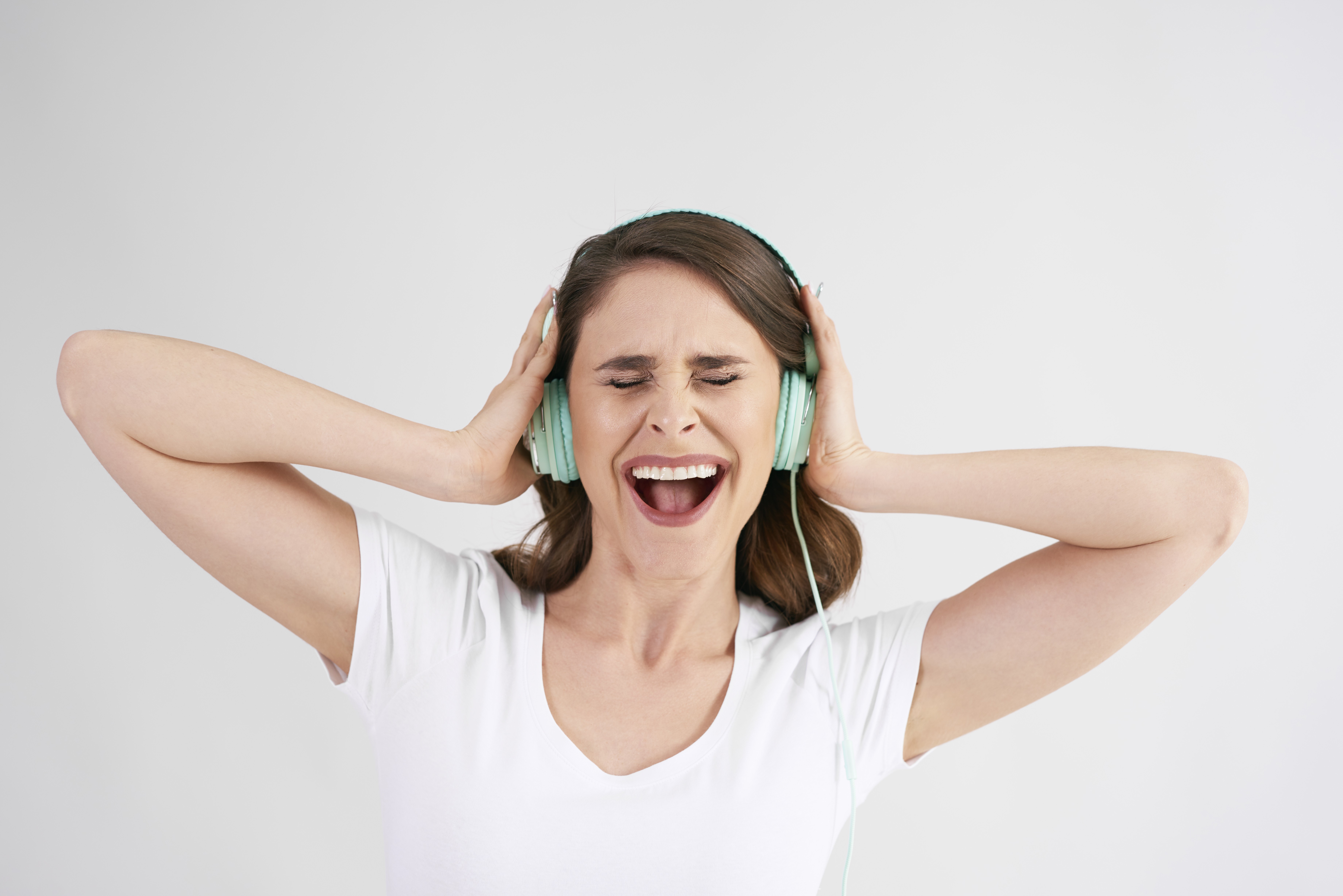 O que acontece com o cérebro quando uma música não sai da cabeça?